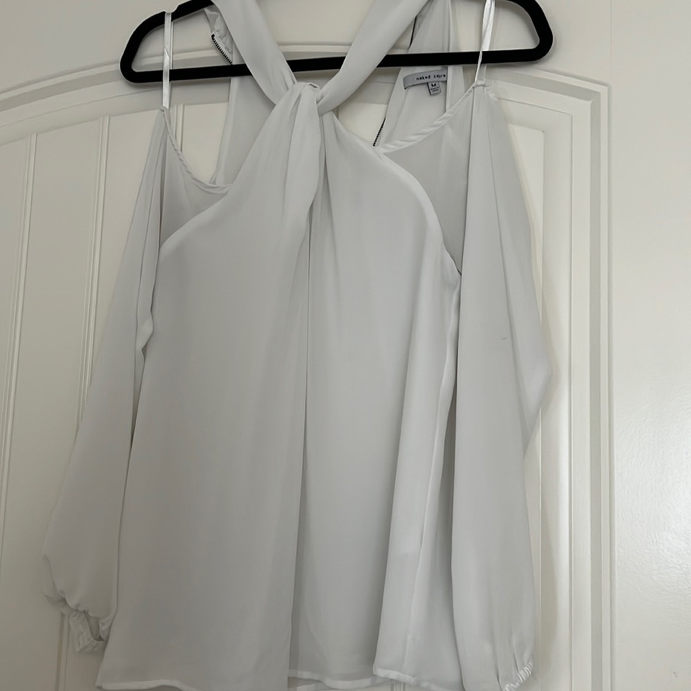White off the shoulder top. Really beautiful for business meetings.